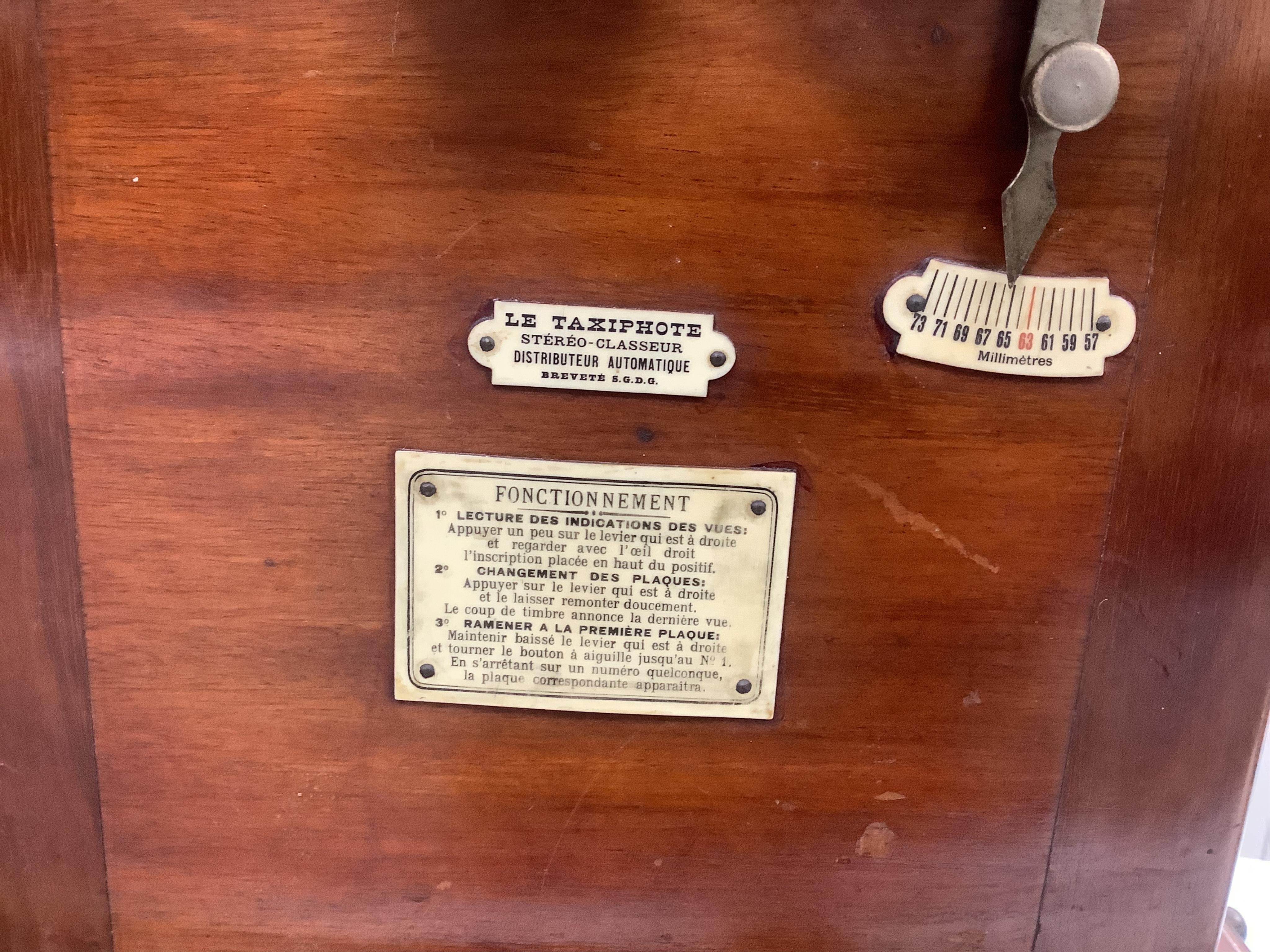 A late 19th century French mahogany Taxiphote stereoscopic table top viewer, 51cm high, 33cm wide